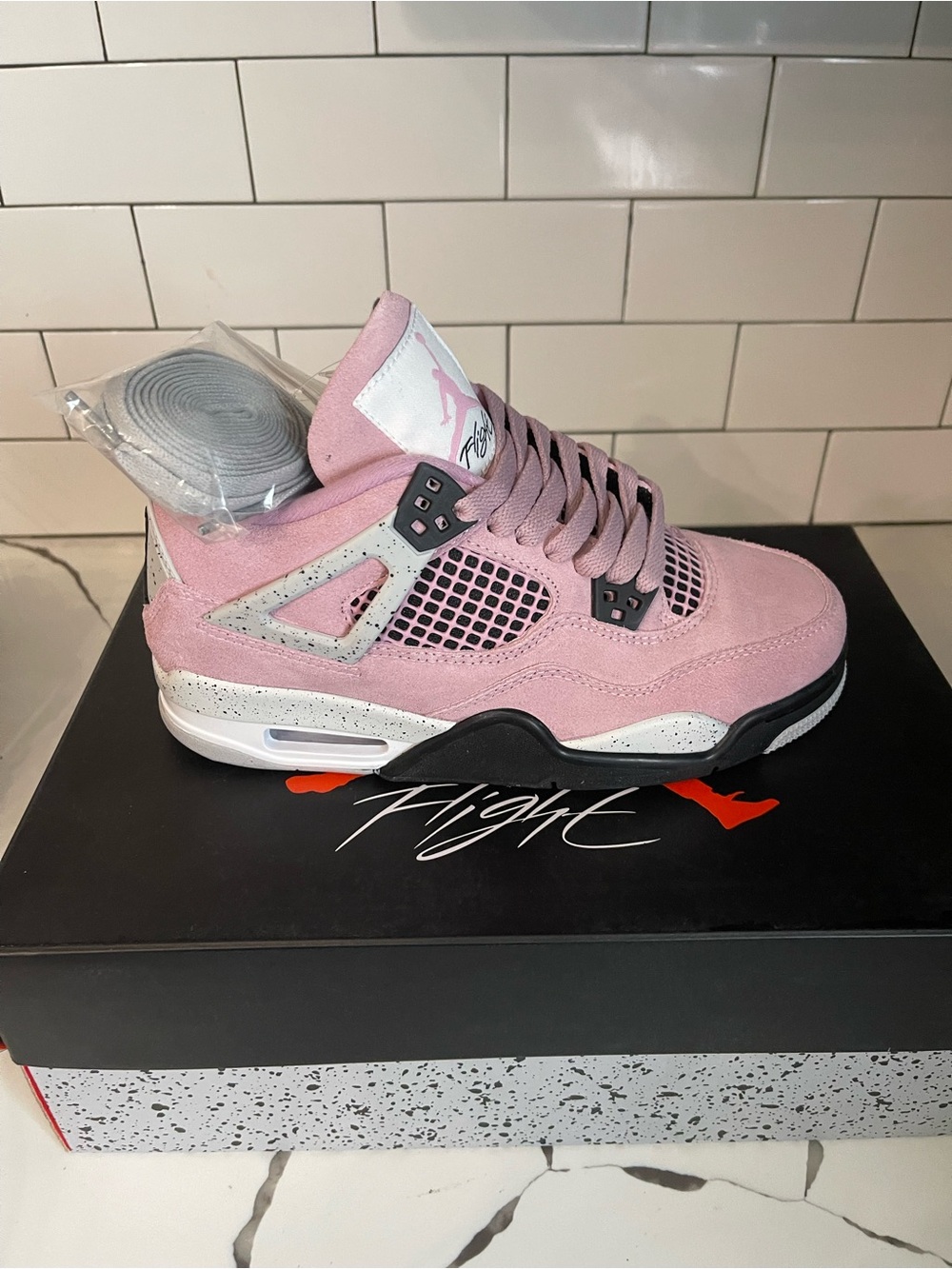 Men’s Retro 4 Pink Orchid Size 7.